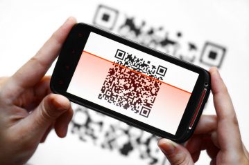 Глава «Тинькофф» не поддержал идею введения оплаты QR-кодами